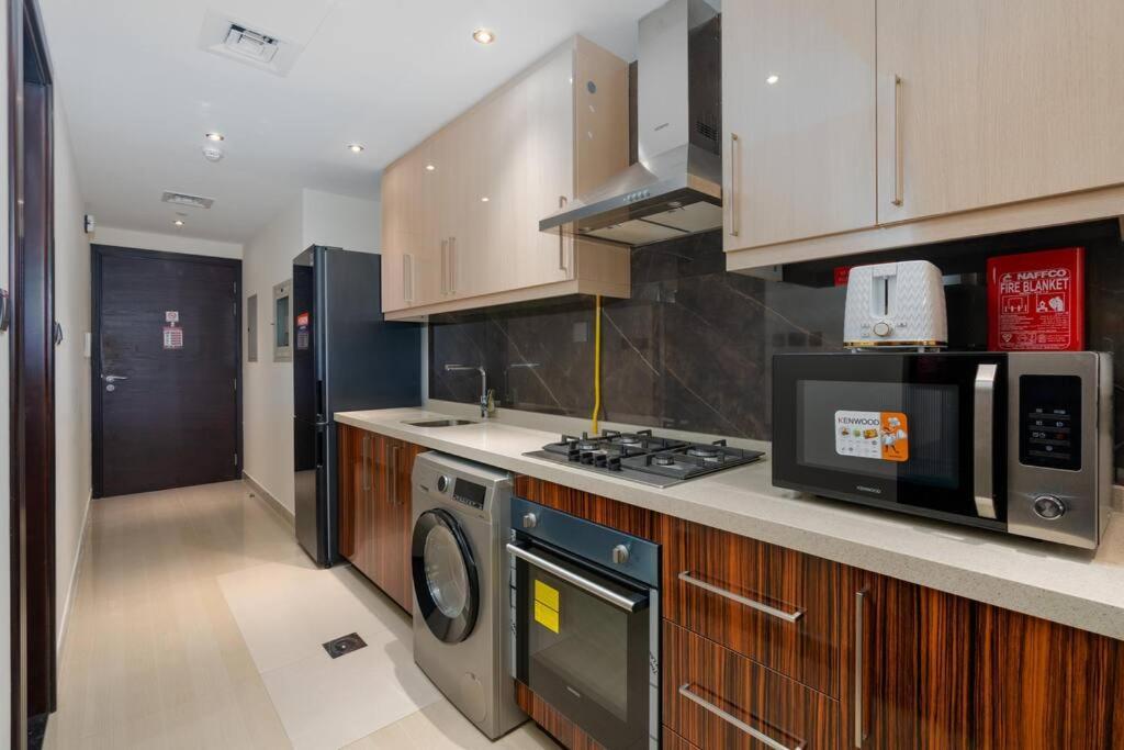 White Sage - Elite Residence Studio Dubai Bagian luar foto